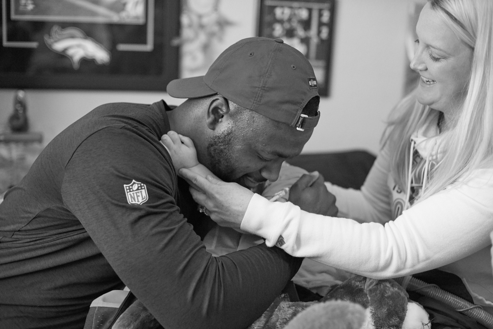 Dee Mount hugging Truett with his family